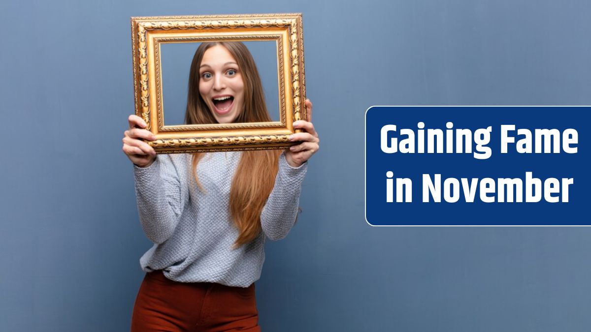 Young pretty woman with a baroque frame against blue wall.